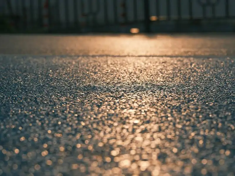 Fresh sealcoat on asphalt